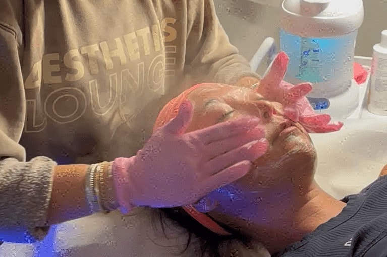 Facial treatment in a spa setting.