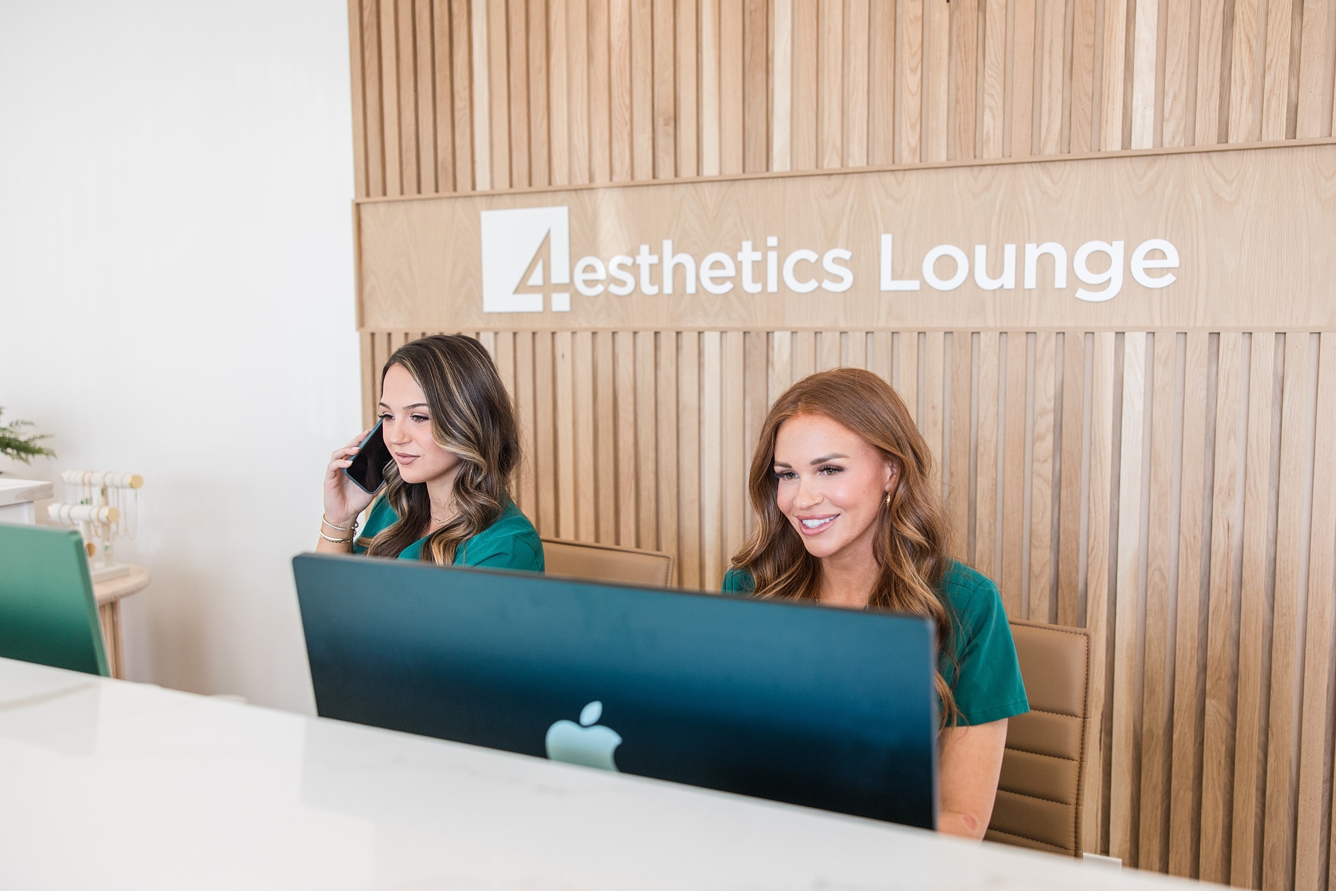 Receptionists working at Aesthetics Lounge.