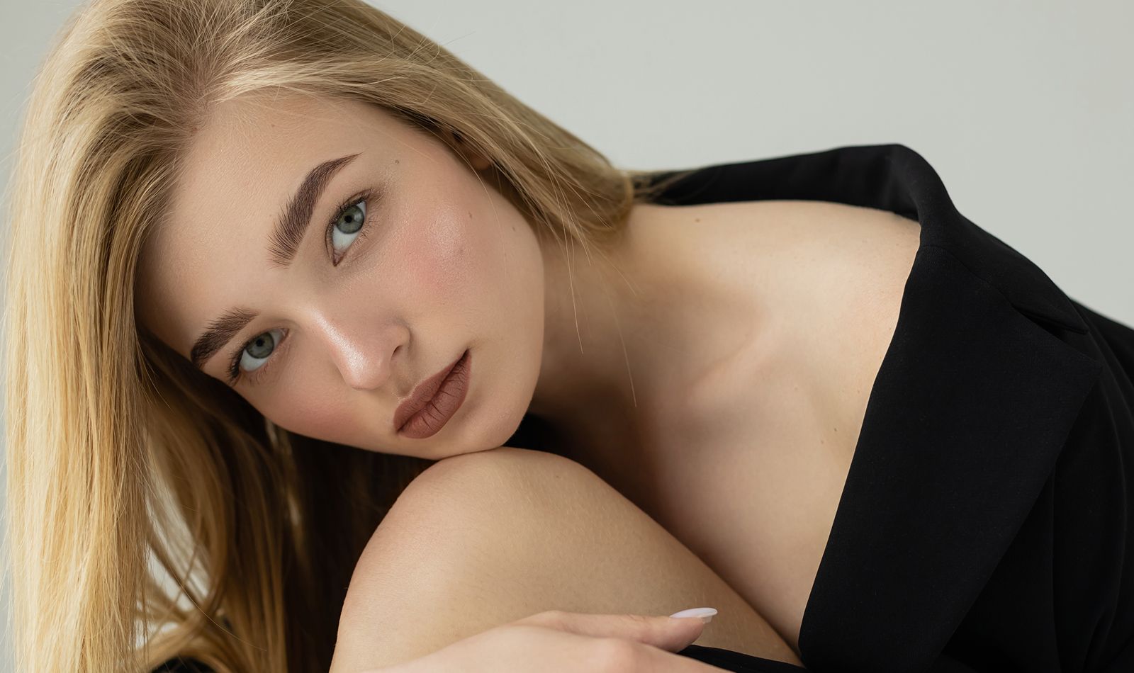 Close-up of a woman with blonde hair.